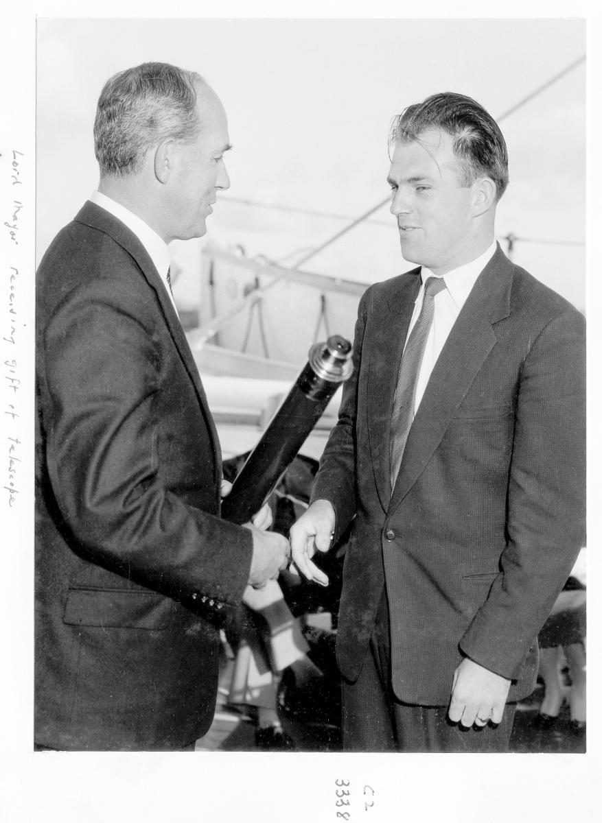 1959 Centenary celebrations - Migrant ship "Orion", Lord Mayor Reginald Groom receiving gift of telescope - Brisbane, August 1959