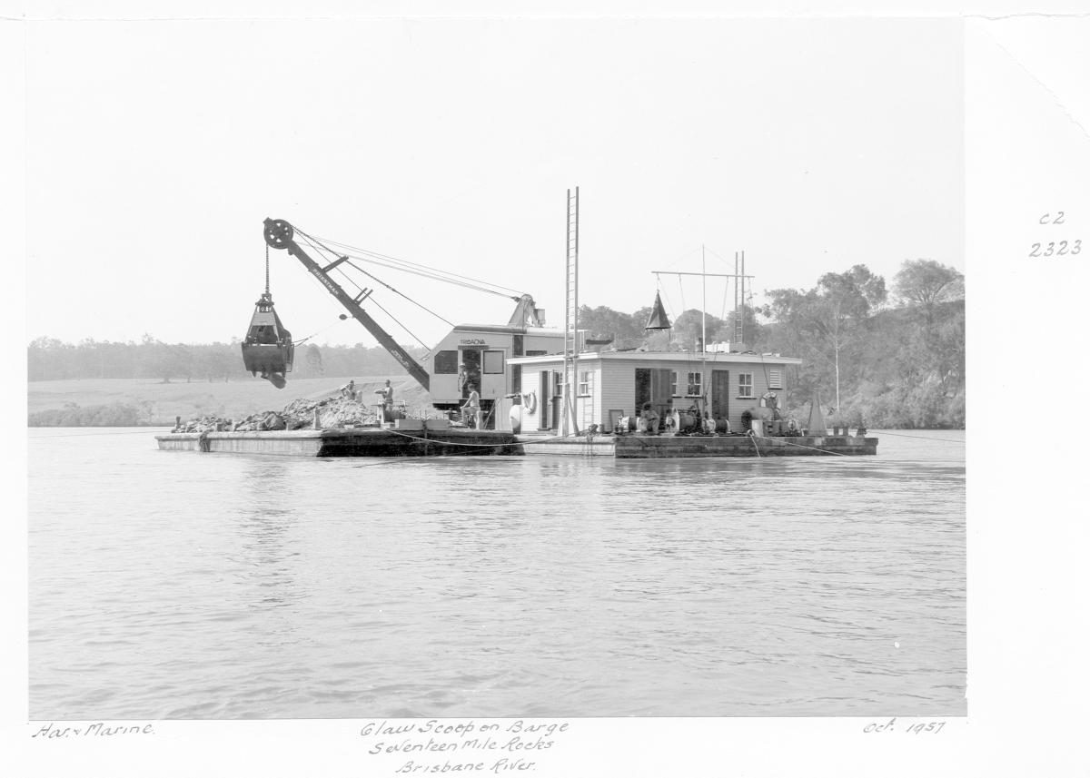 Claw scoop on barge, Seventeen Mile Rocks, Brisbane River, October 1957