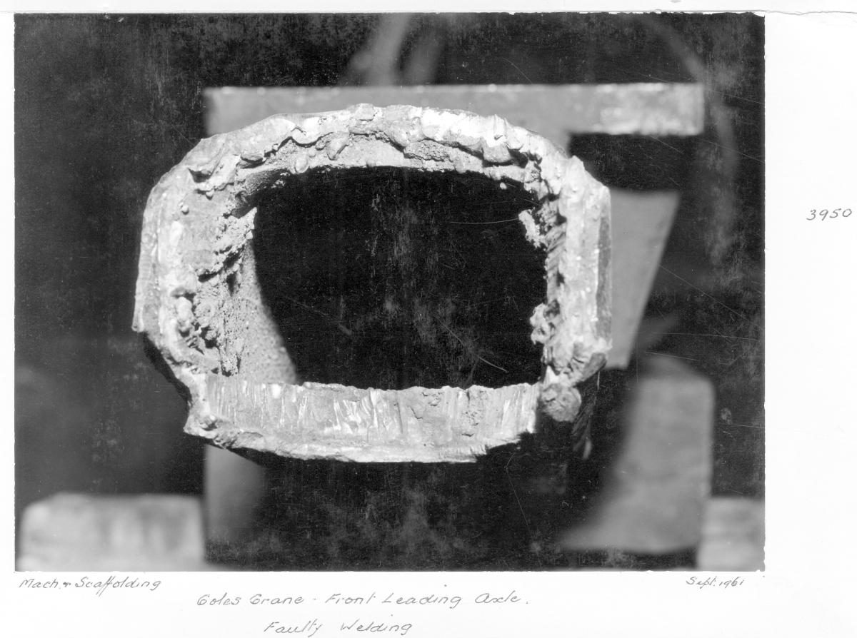 Faulty welding on front leading axle of Coles crane - Brisbane, September 1961