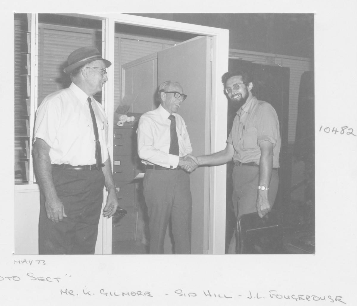 Mr K Gilmore, Mr Sid Hill and Mr Jean Louis Fougerouse at the Survey Office Photo Section - Brisbane, May 1973