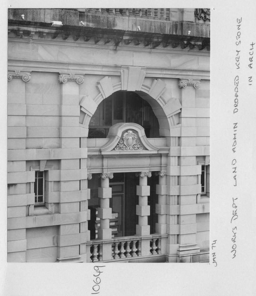 Works Department Lands Administration building, dropped keystone in arch - Brisbane, January 1974, Brisbane City