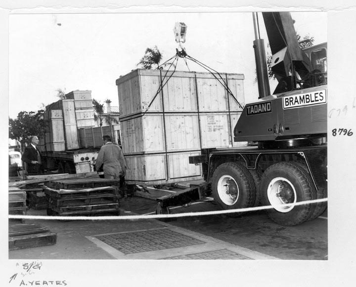 Camera rear section being unloaded, Executive Building, William Street, Brisbane, April 1970, Brisbane City