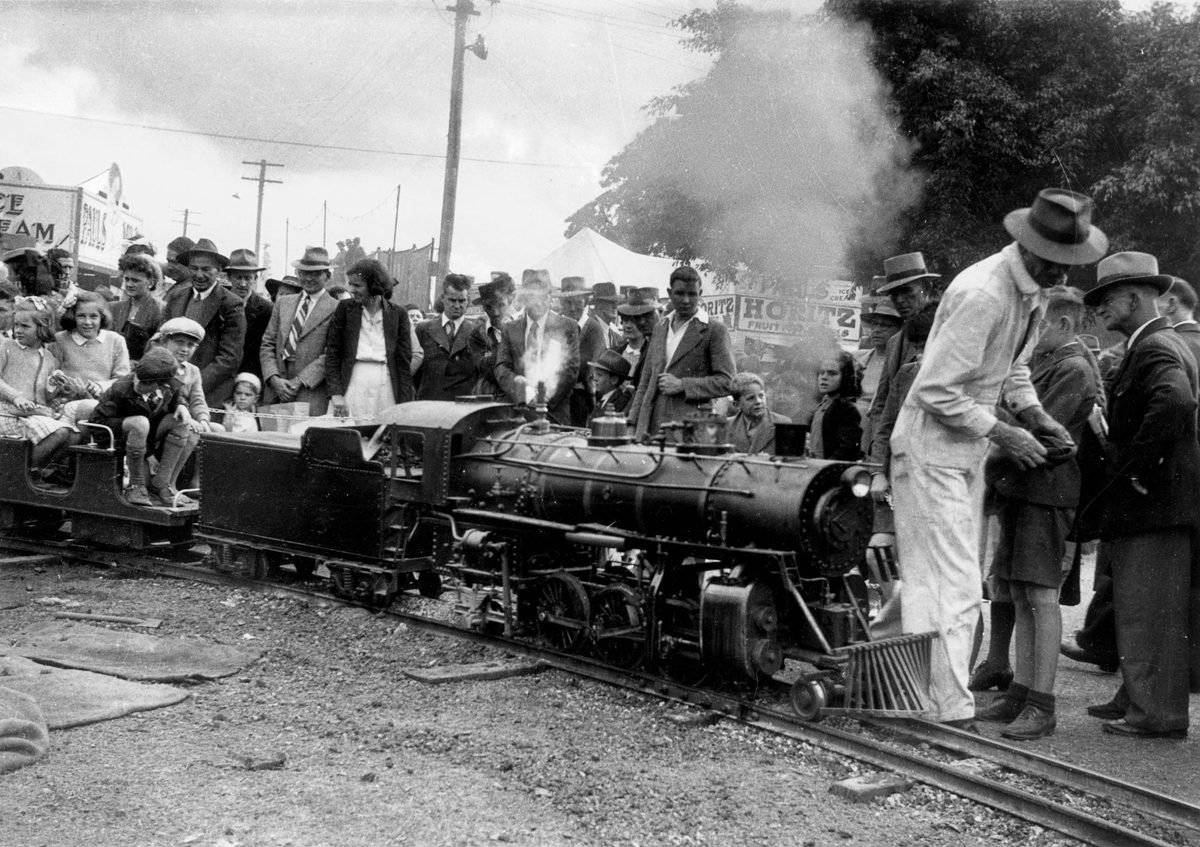 Children enjoying a ride on the miniature railway at the Brisbane Ekka in 1948, Bowen Hills