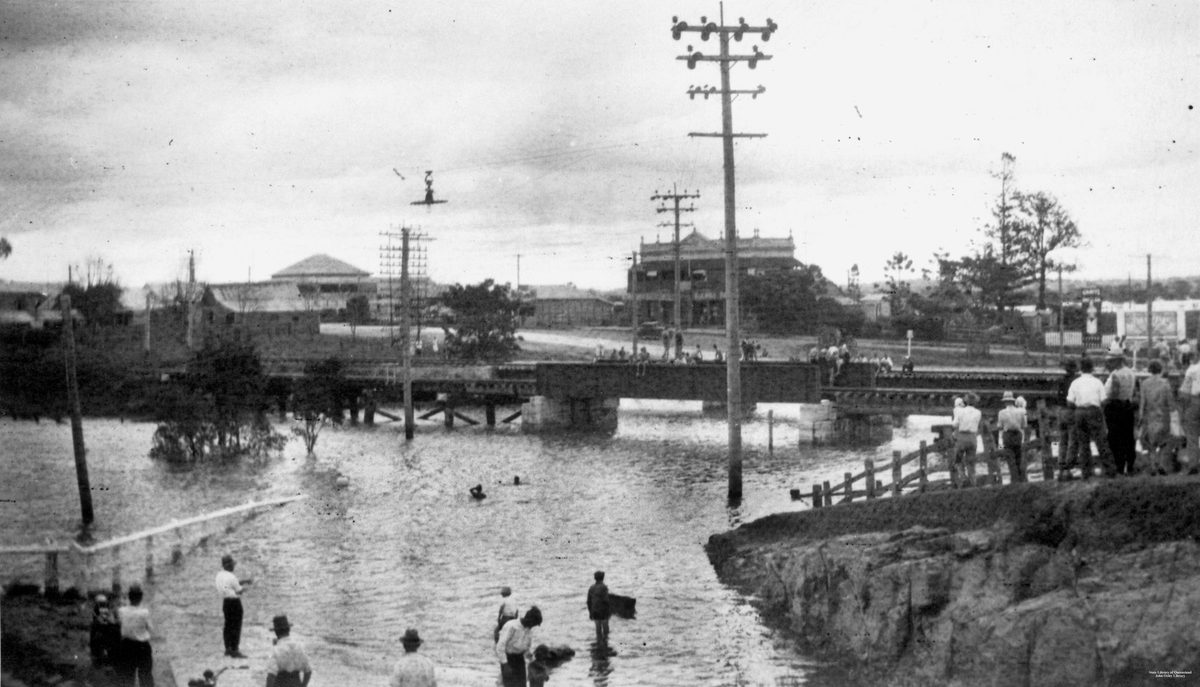 Local people observing the flood waters at Rocklea, Brisbane, 1930