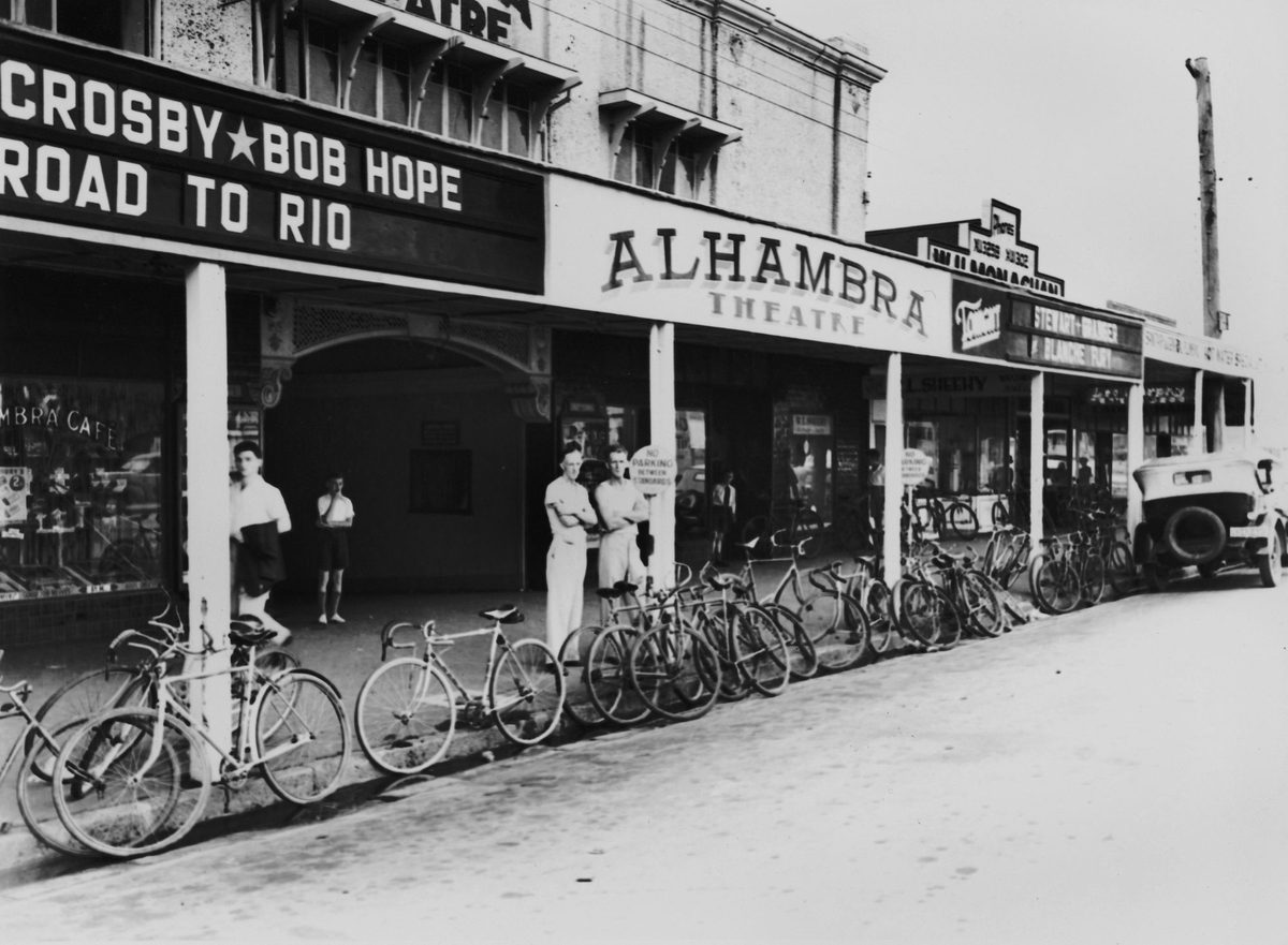 Bicycles parked outside the Alhambra Theatre, Stones Corner, Brisbane, 1949
