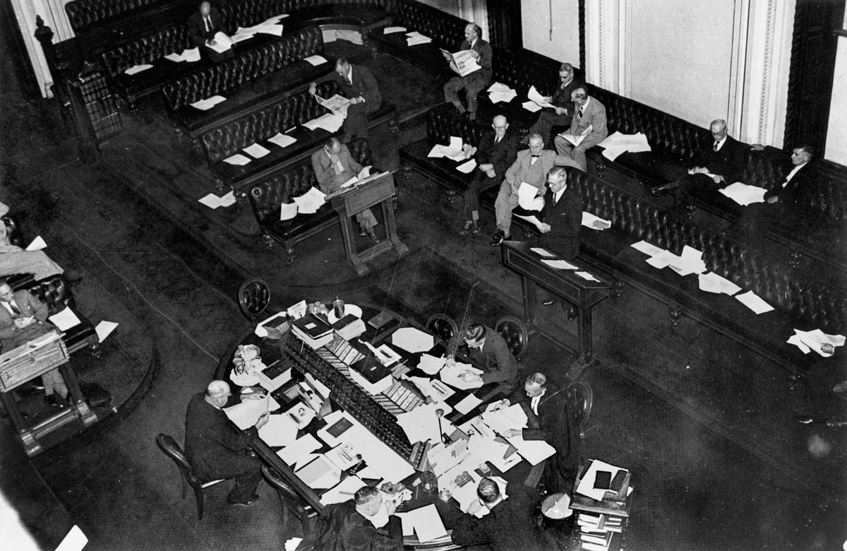 Premier Hanlon delivering the budget to Parliament in 1948, Brisbane