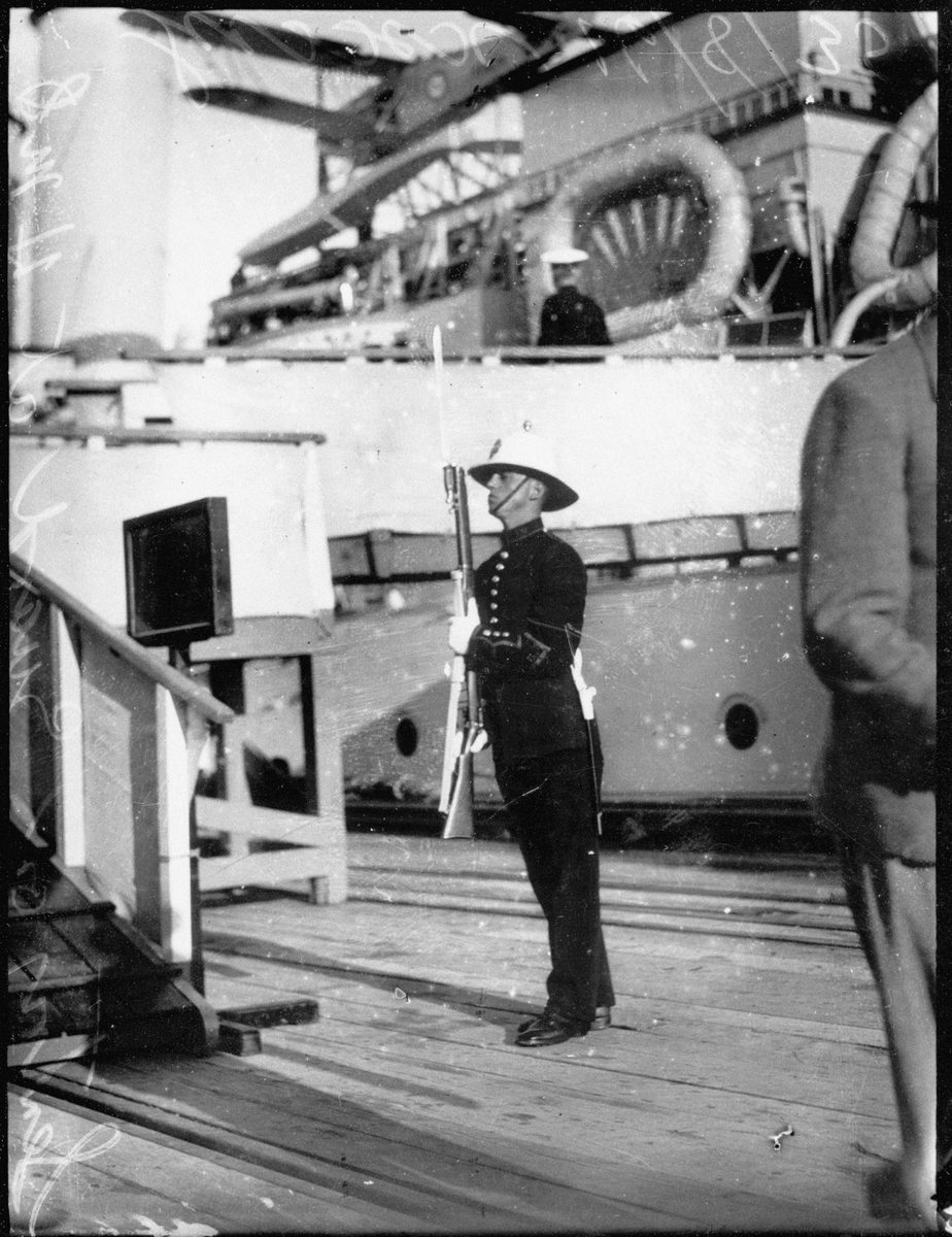 Sentry on guard on HMS Sussex, Brisbane, 1935