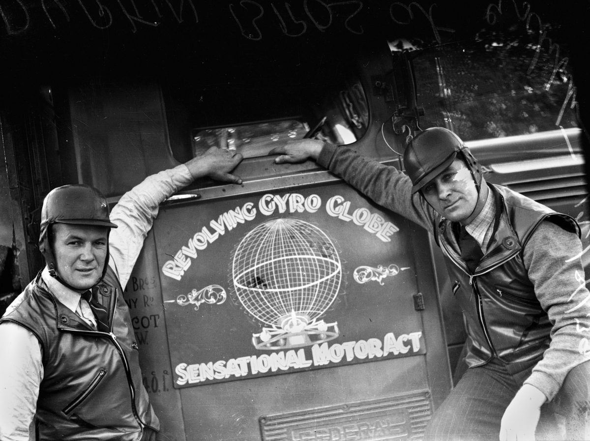 Helmeted drivers from the Revolving Gyro Globe Sensational Motor Act at Brisbane's Exhibition Ground, 1939, Bowen Hills