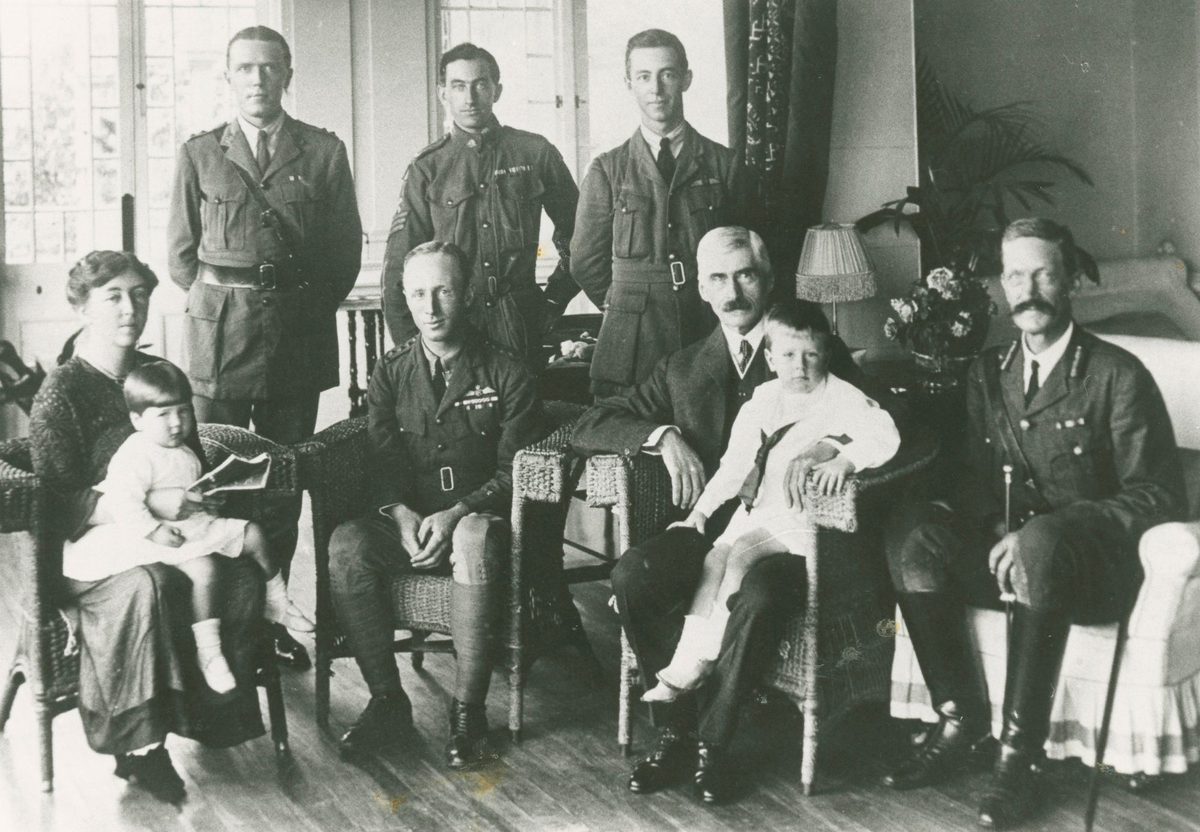 Sir Hamilton and Lady Goold-Adams with their children and other officals inside Government House at Paddington, 1919