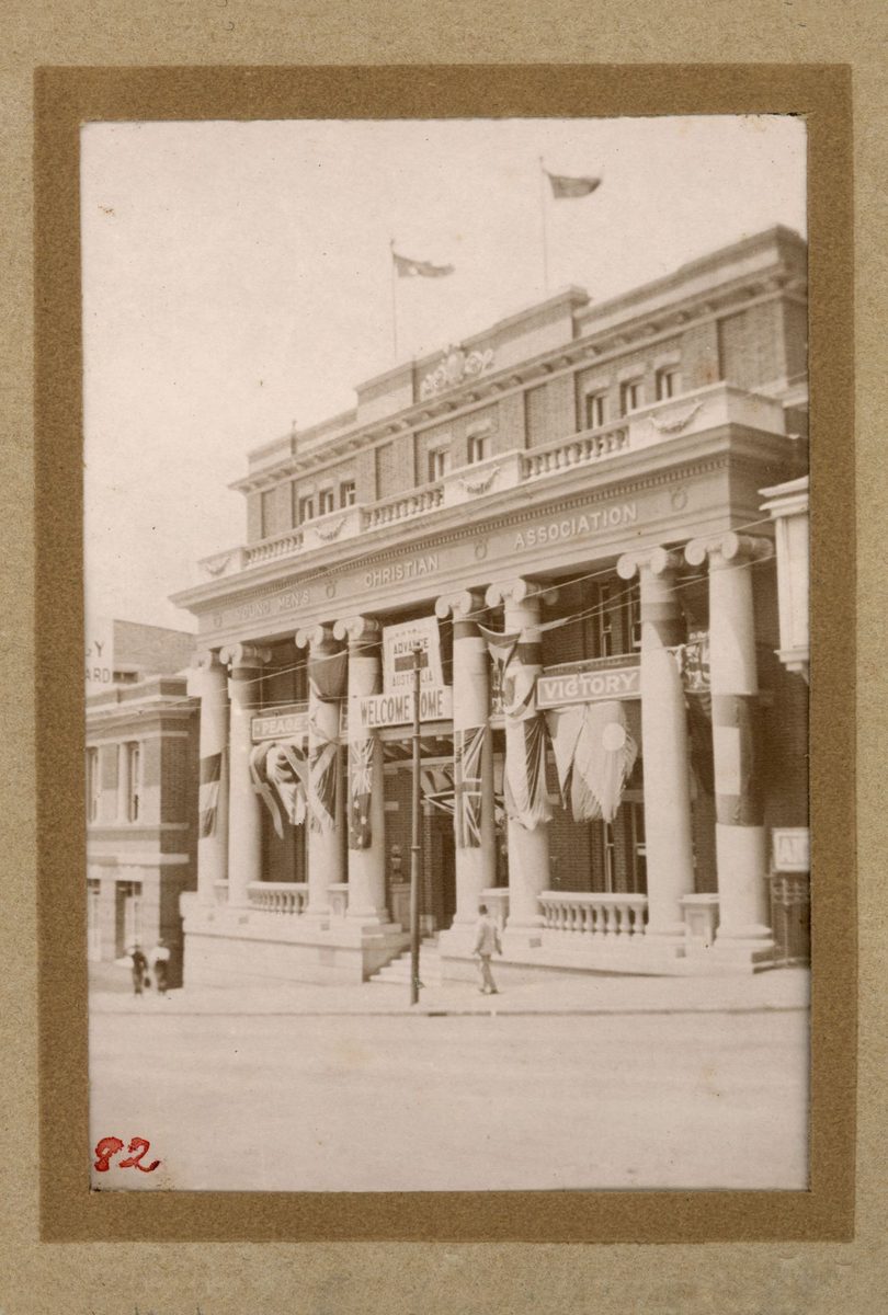 Young Men's Christian Association building draped with flags and banners, Brisbane City (1918)