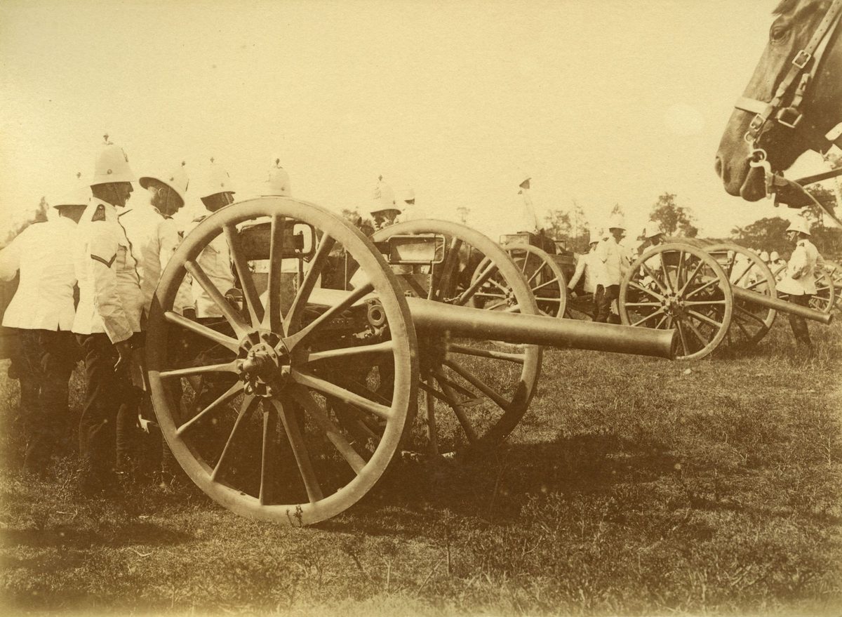 Soldiers preparing to fire the cannons at a military display in the Domain, Brisbane, 1901, Brisbane City