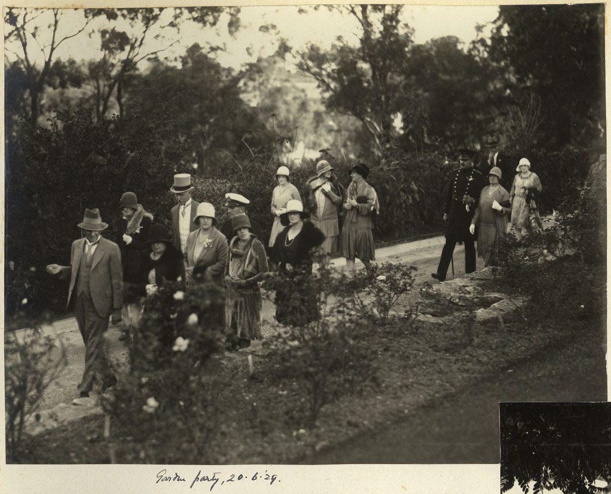 Sir John Goodwin and guests at a garden party in the grounds of the Governor's residence, Brisbane (1929)
