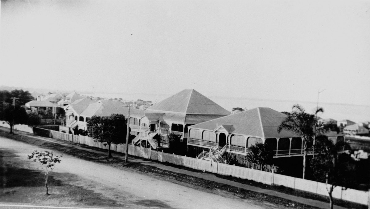 Looking out to sea over a row of high-set houses on Brighton Road, Sandgate, 1924