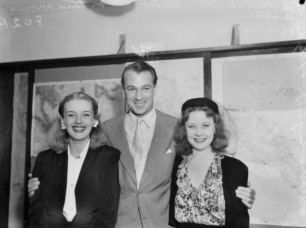 Gary Cooper and other American actors at a Brisbane press conference, November 1943