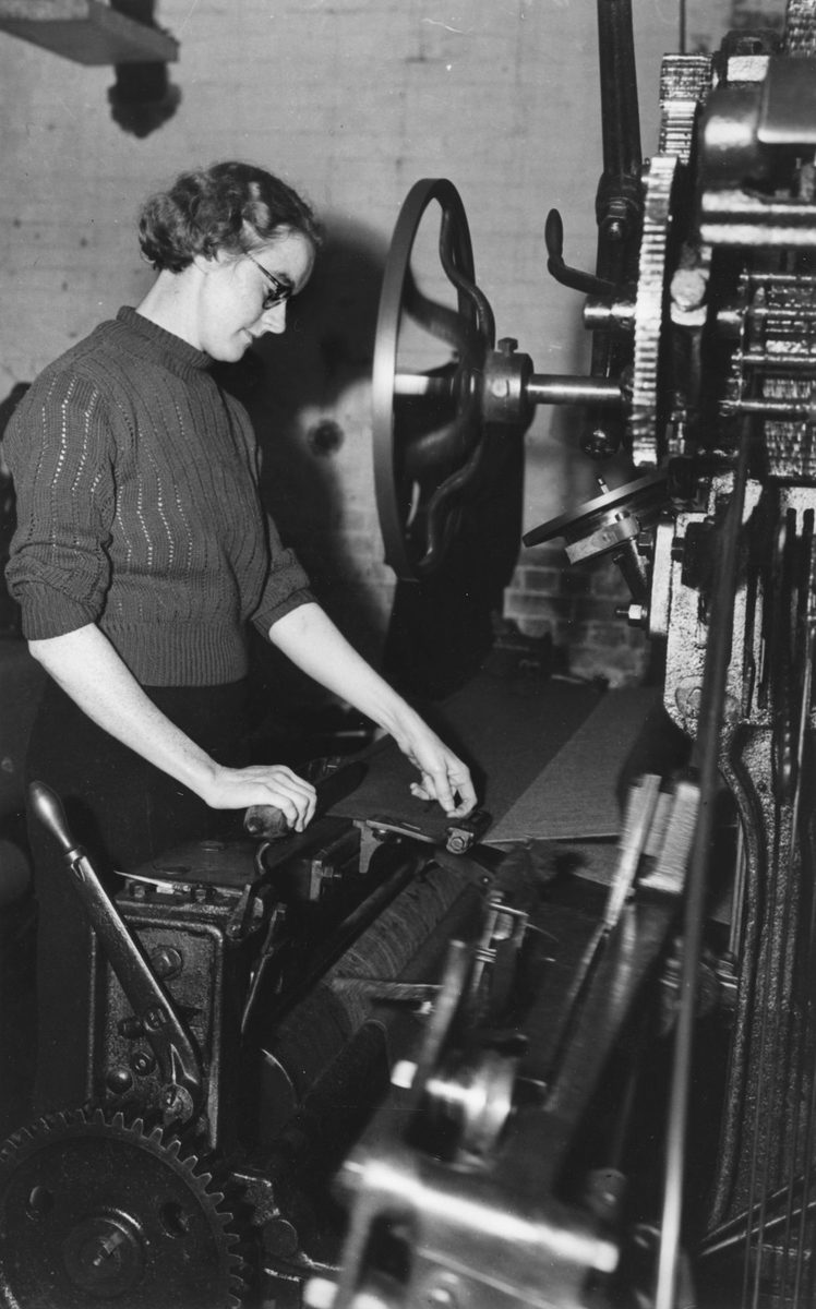 Women producing uniforms for the defence forces in a Brisbane clothing factory, 1940