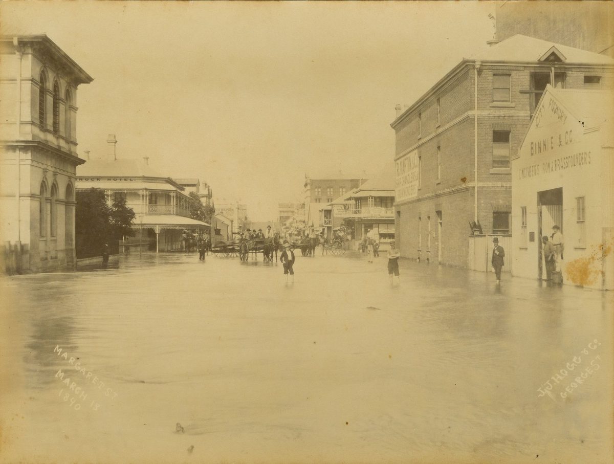 People standing in flooded Margaret Street, Brisbane, 1890, Brisbane City