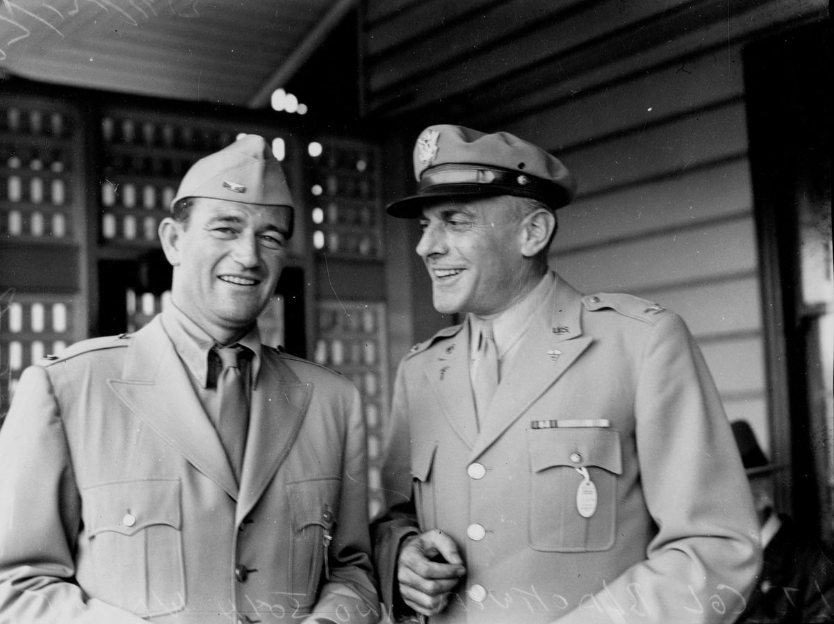Lieutenant Colonel Blackween with actor John Wayne at Albion Park races, Brisbane, 1943