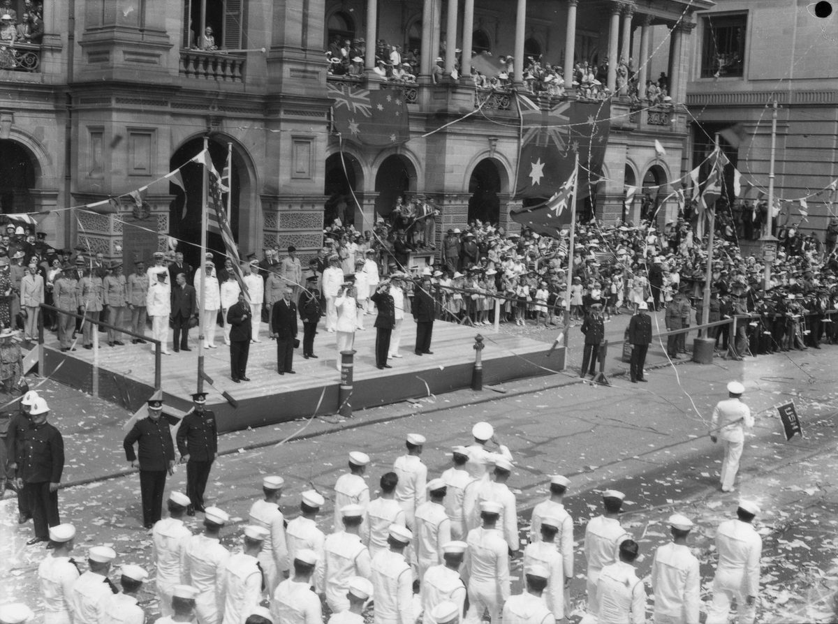 Taking the salute on the steps of the Brisbane Post Office building, Queen Street, Brisbane City (1941)