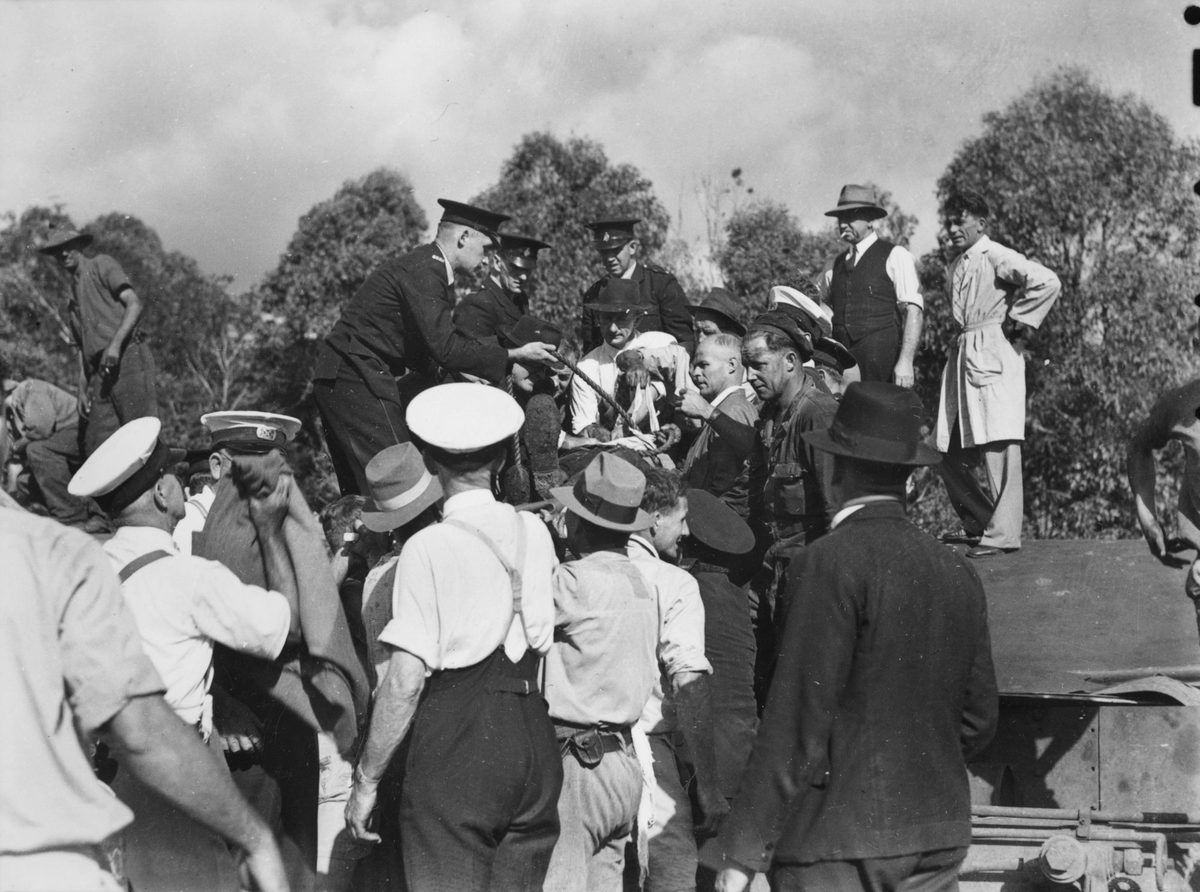 Rescue workers attending a railway accident at Camp Mountain, 1947
