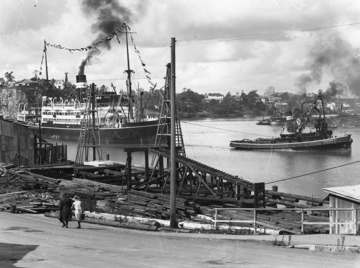 A.U.S.N ship, Orungal being pulled by the tug, Forceful up the Brisbane River. 1953 (1935)