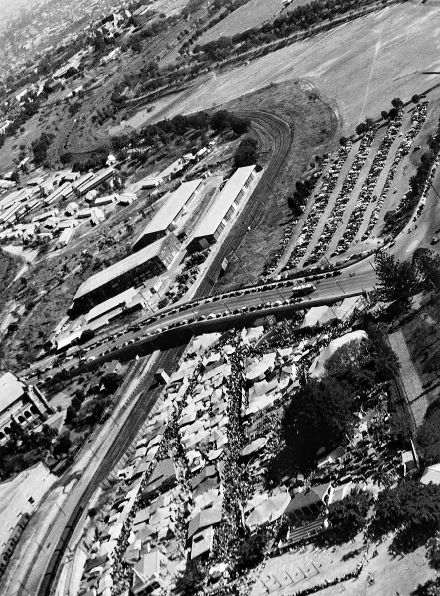 Aerial view of the Exhibition Ground, showing Sideshow Alley and parking area during Ekka time, Brisbane, 1946, Bowen Hills