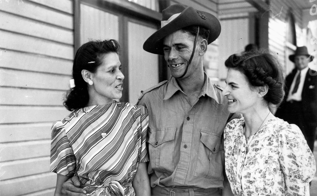 Returning soldier being greeted at the station by loved ones, Brisbane, January 1942