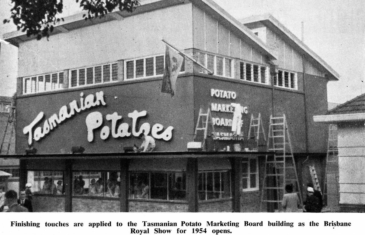 Finishing touches are applied to the Tasmanian Potato Marketing Board building, Exhibition Ground, Brisbane, 1954, Bowen Hills
