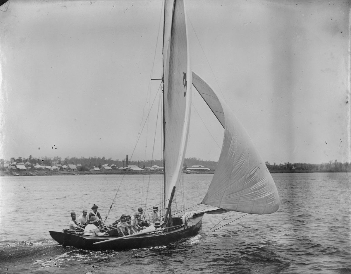 Group of people in sailing boat on the Brisbane River, 1896