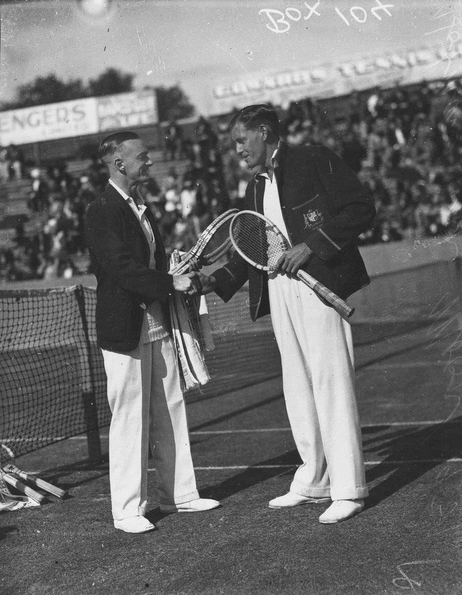 Harry Hopman and Edgar Moon shake hands on a tennis court in Brisbane, 1931