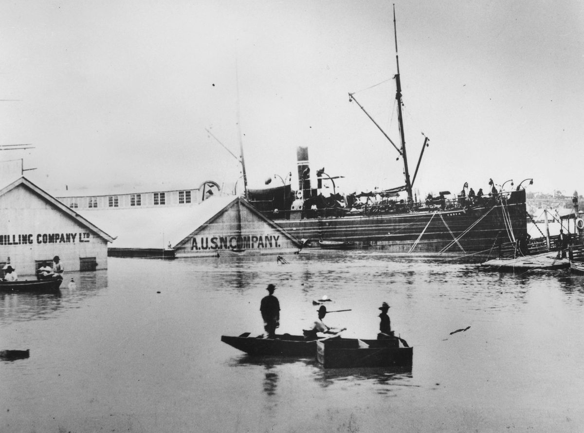 View of the ship Corea at the Eagle Street Wharves, Brisbane, during the 1893 floods, Brisbane City