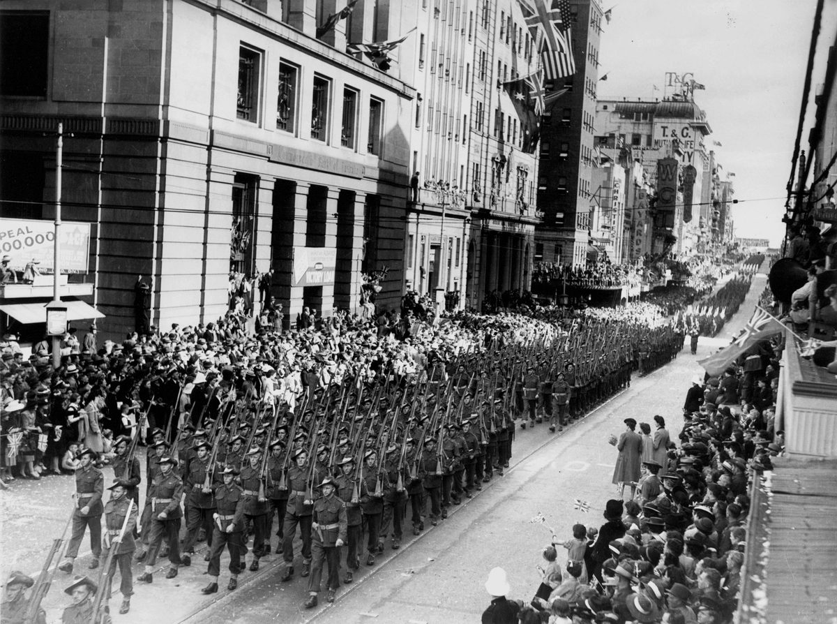 Returned World War Two soldiers march in Queen Street, Brisbane, 1944, Brisbane City