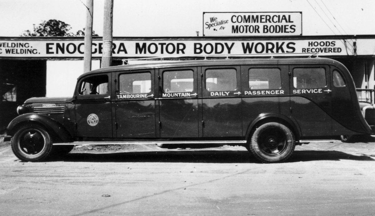 New Oldsmobile bus in front of the body work shop, 1937, Enoggera