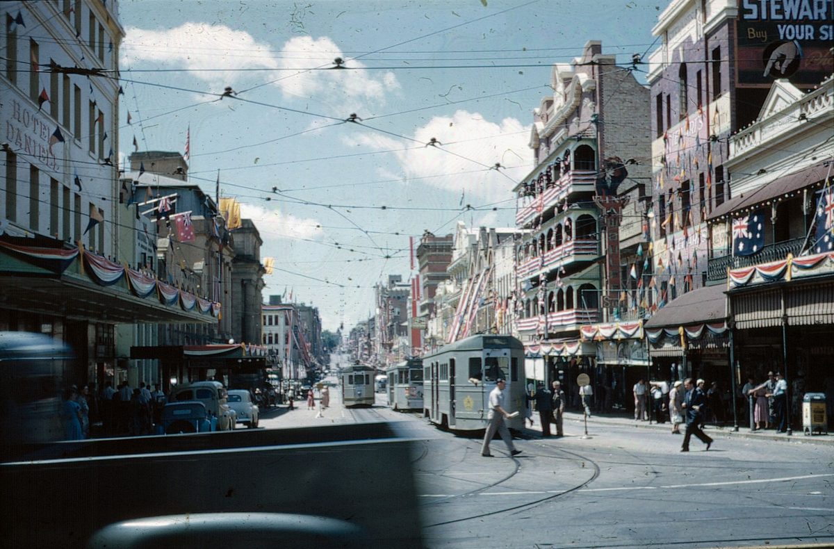 View along Adelaide Street from George Street with the buildings decorated for the Royal Visit, 1954, Brisbane City