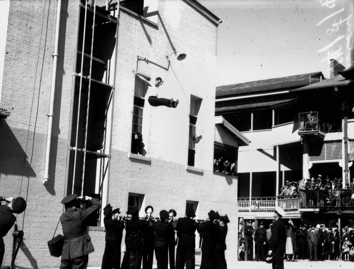 Brisbane fire brigade officers demonstrate rescue techniques and equipment to the public, 1943
