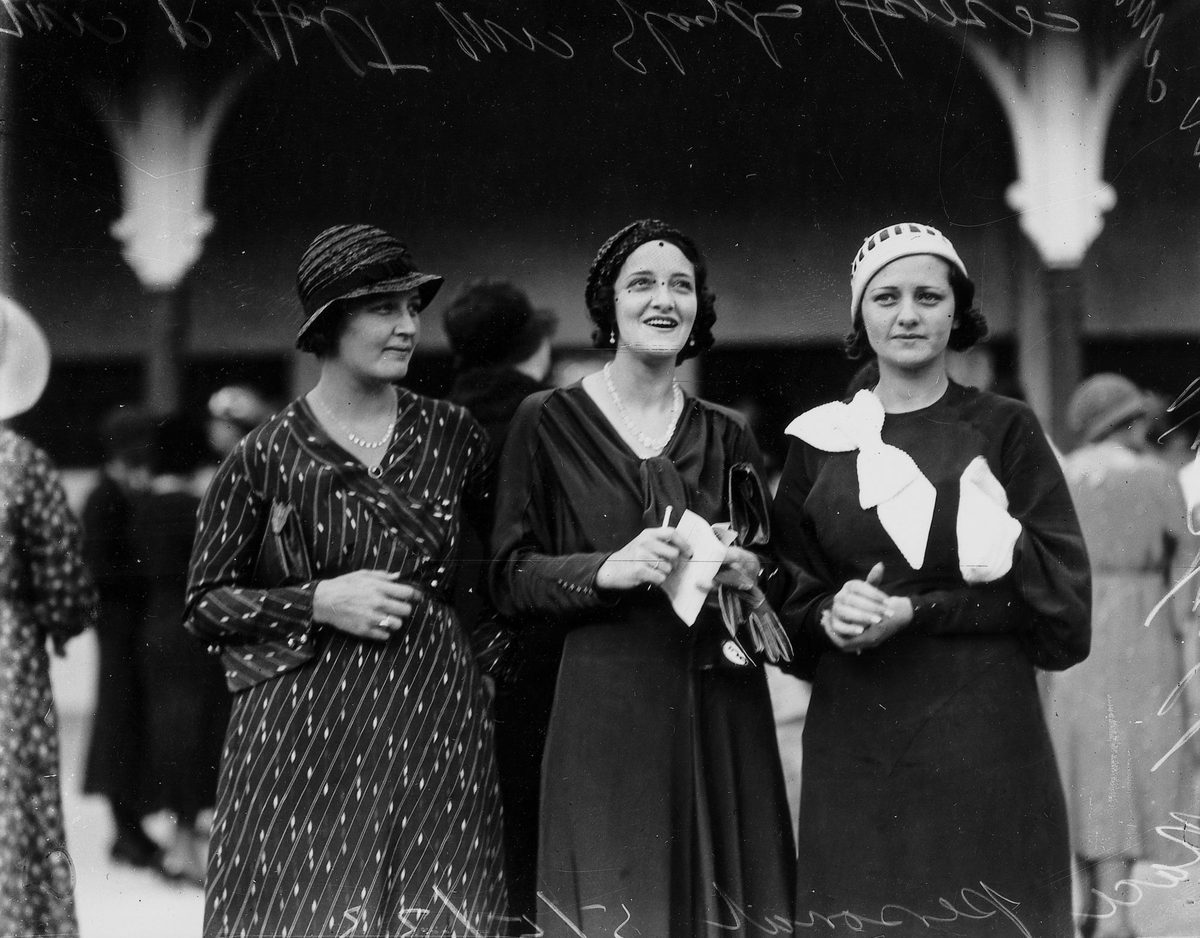 Mrs R. Holt, Mrs Gladys Harris and Miss Peggy Horsheid at Ascot races, Brisbane, May 1933