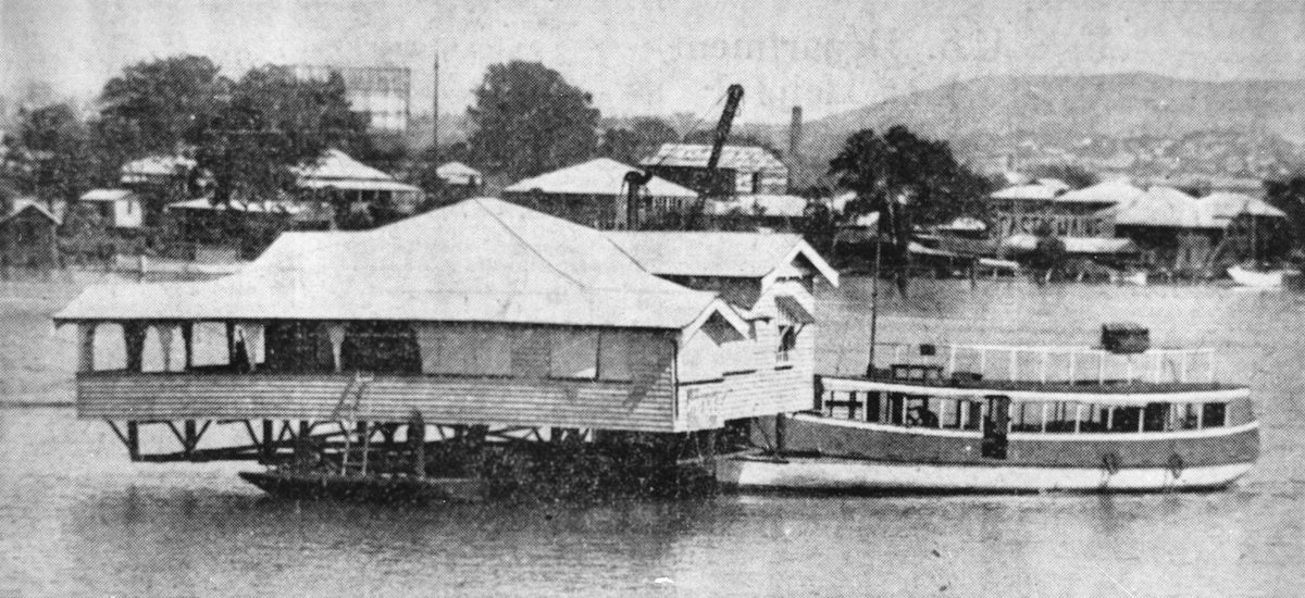 House floating down the Brisbane River from Bulimba to Bishop Island in 1934