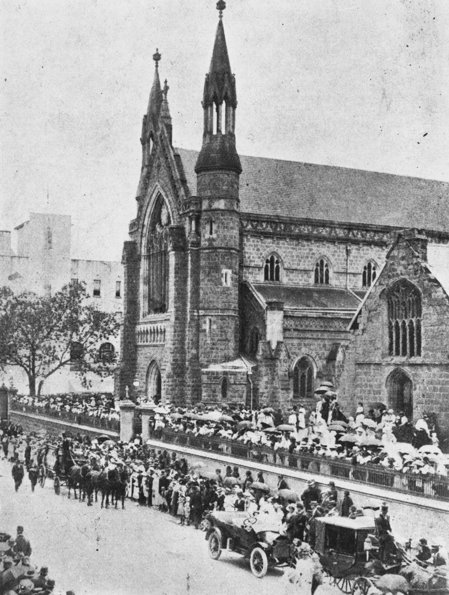 Crowd gathers outside St. Stephen's Cathedral for the funeral of Archbishop Robert Dunne, Brisbane, 1917, Brisbane City