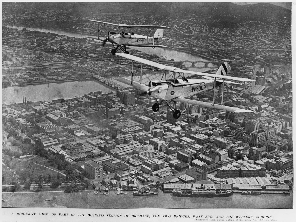 Aerial views of Brisbane showing two bridges, the western suburbs and West End, 1933
