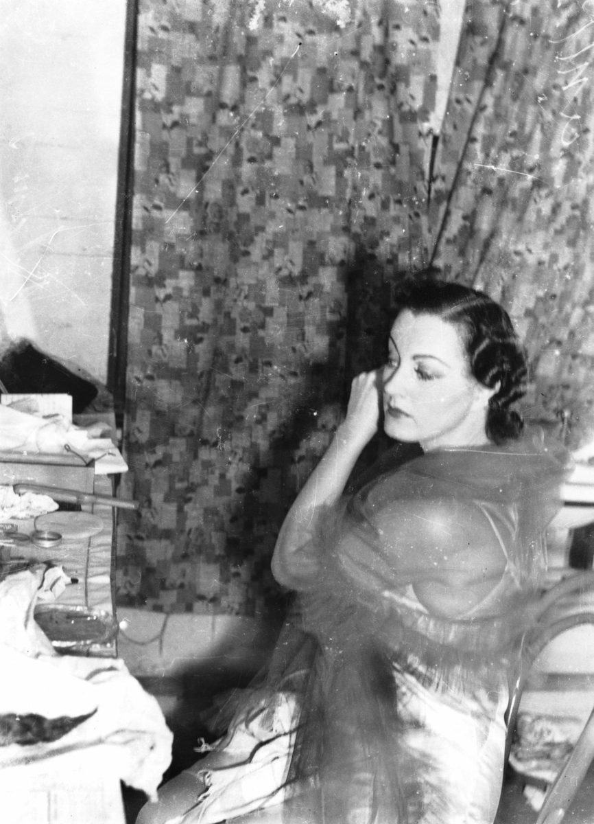 Miss Margaret Adams getting ready in her dressing room, Brisbane, 1938