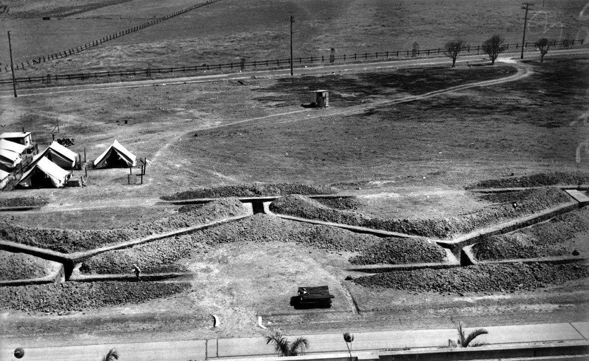 Trenches under construction at the Ford Motor Works, Eagle Farm, Brisbane, 1942