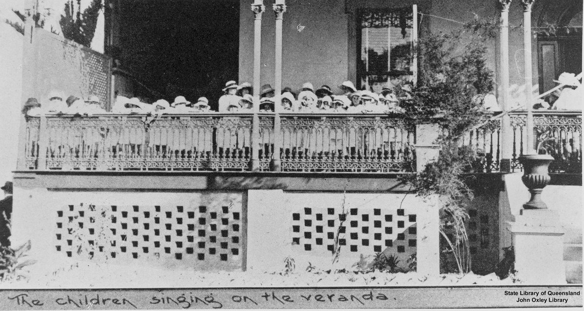 Children on the verandah of Alexandra Home, Coorparoo, Brisbane, Queensland, 1921