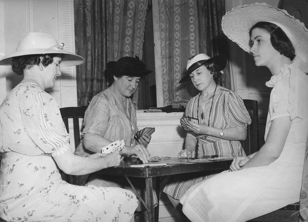 Ladies playing cards at a Melbourne Cup party, Brisbane, 1938