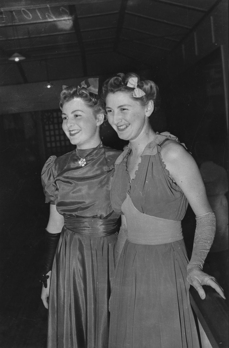 Misses Nell and Gwen McKay guests at the movie ball, held at the Trocadero, August 1940, South Brisbane