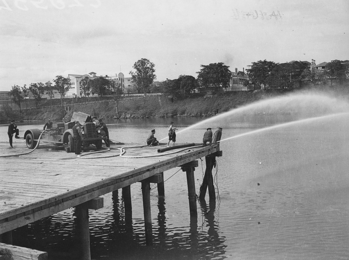 Tests of Brisbane's latest fire-fighting equipment at the Gravel Wharf, South Brisbane, yesterday', 1942