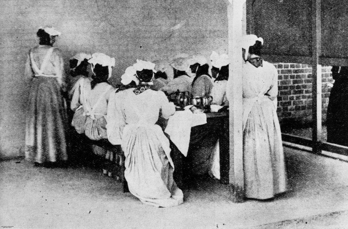 Prisoners having dinner in the exercise yard at the new female division of Boggo Road Gaol, Brisbane, 1903, Dutton Park