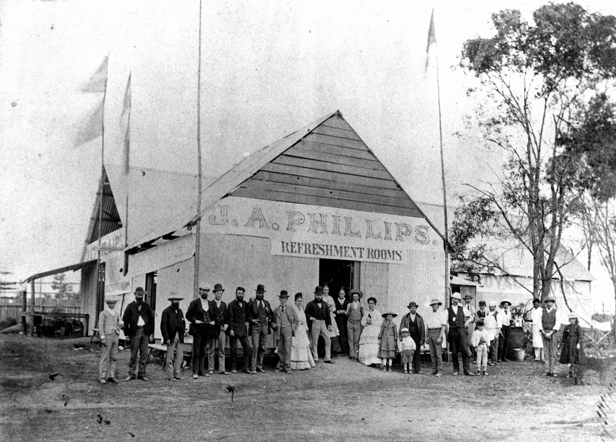 Patrons outside the Refreshment Rooms at the first Queensland Intercolonial Exhibiton held in Brisbane in 1876
