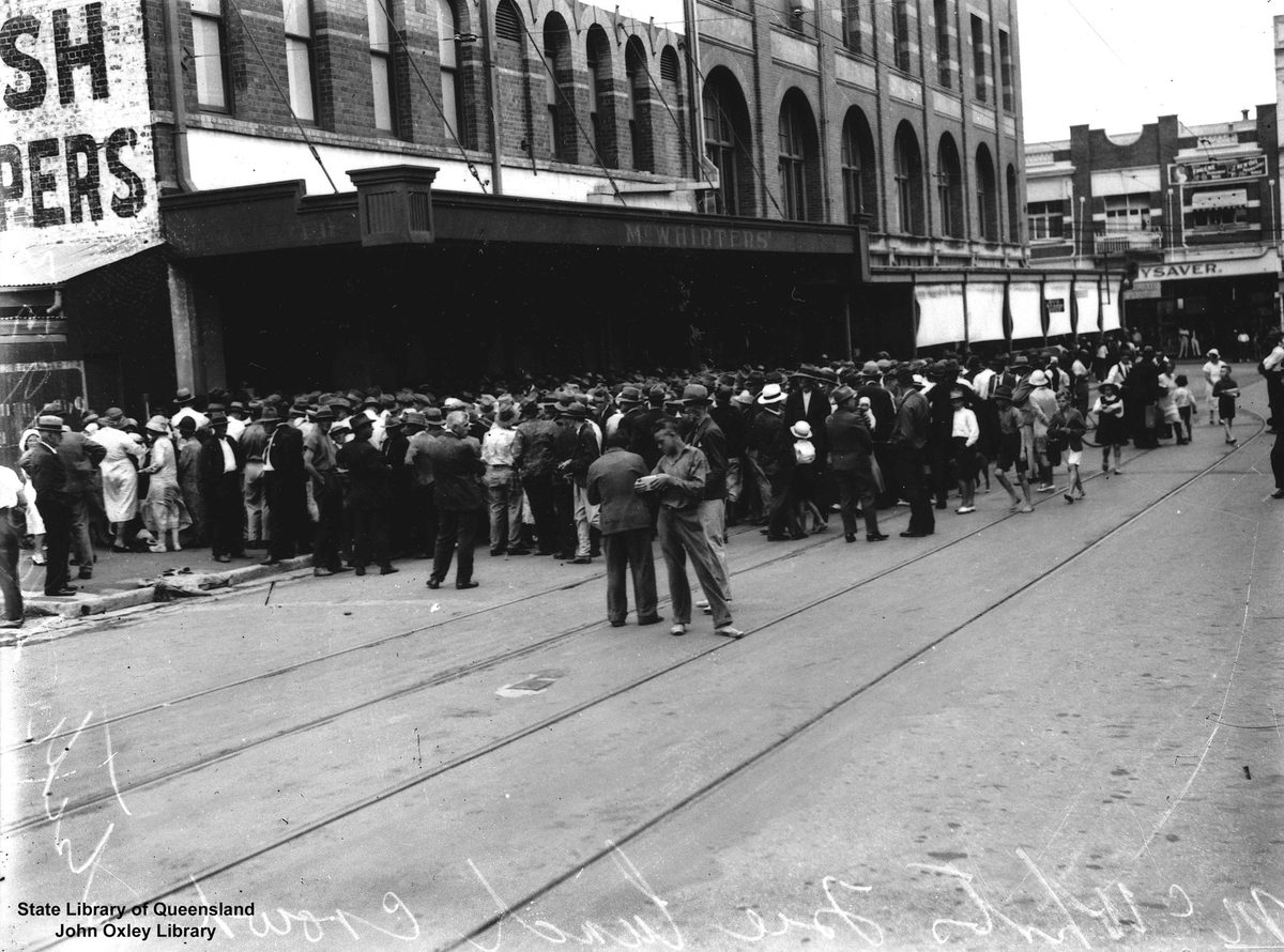 Crowd gathered for free lunch outside McWhirters' building, Fortitude Valley, Brisbane, 1933