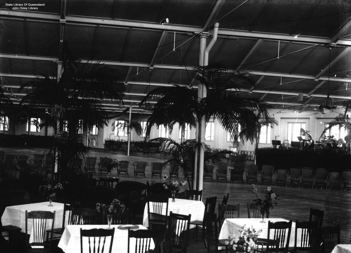 Tables and chairs set up in the woolstore at New Farm, Brisbane, for the Vice-regal ball held in honour of the visiting Duke and Duchess of York, 1927