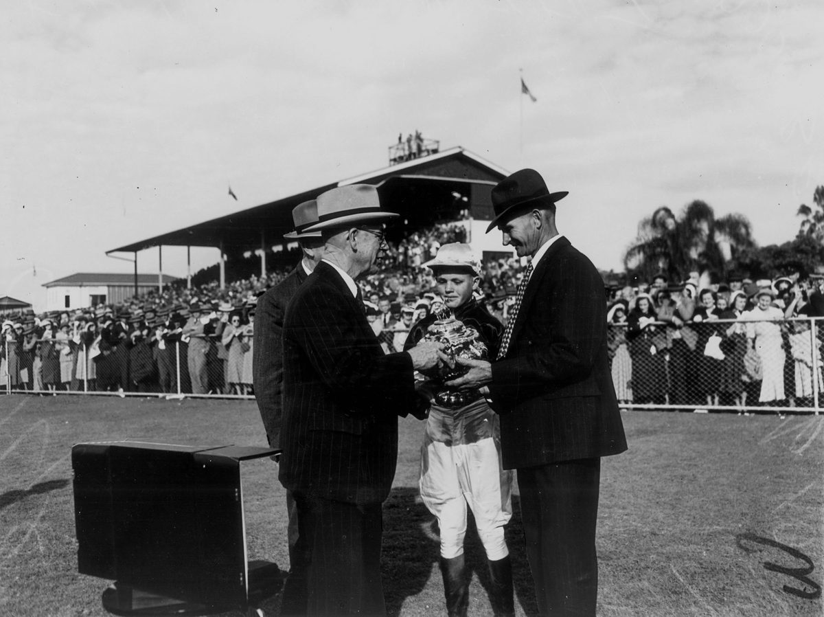 Doomben Cup being presented to H. Lee by E. M. Hanlon, Brisbane, July 1950