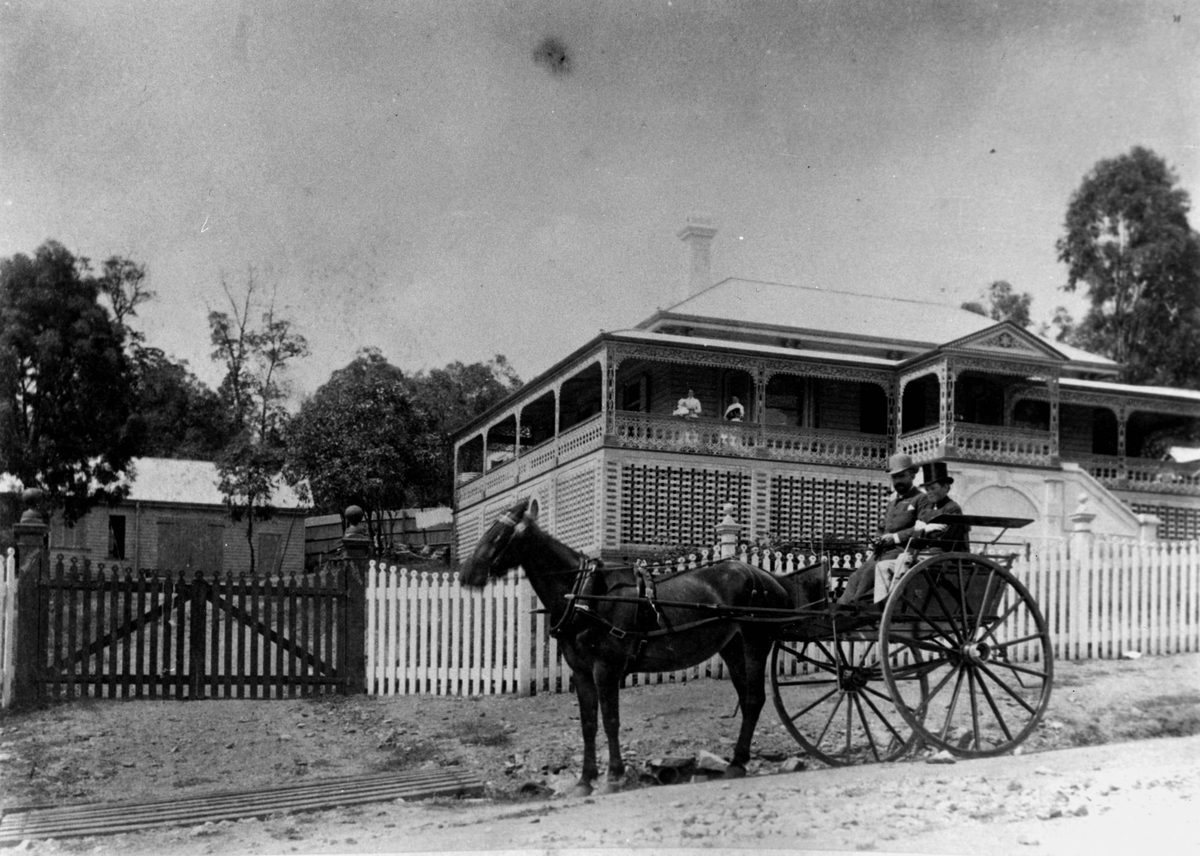 Horse and wagon with driver and footman outside Miegunyah, Brisbane, 1886